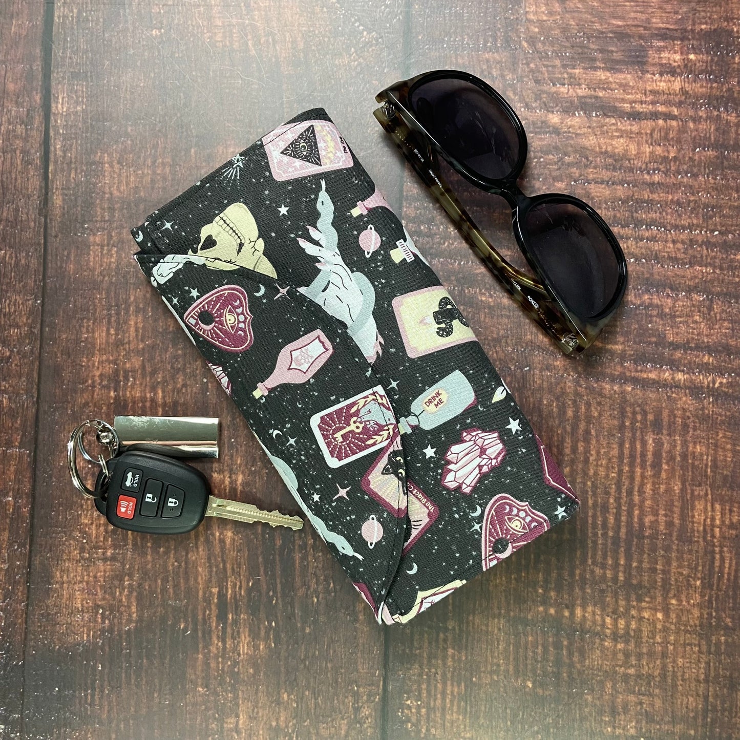Spellbound on Black Folding Tote Bag