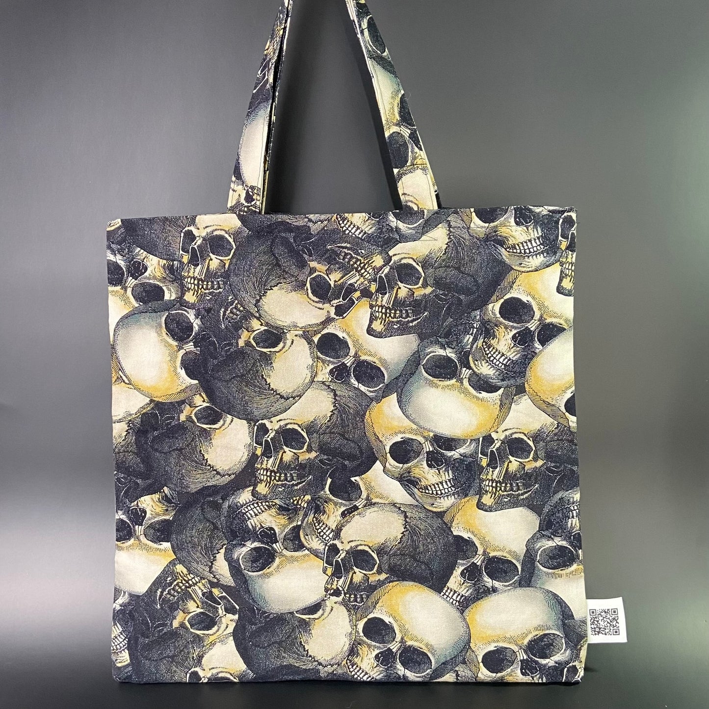 Stacked Skulls Folding Tote Bag